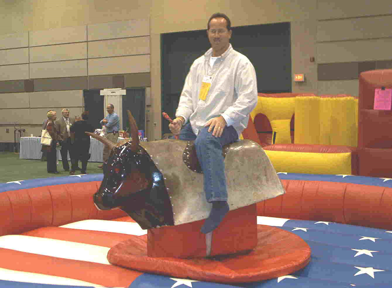 rider's on the bull riding machine